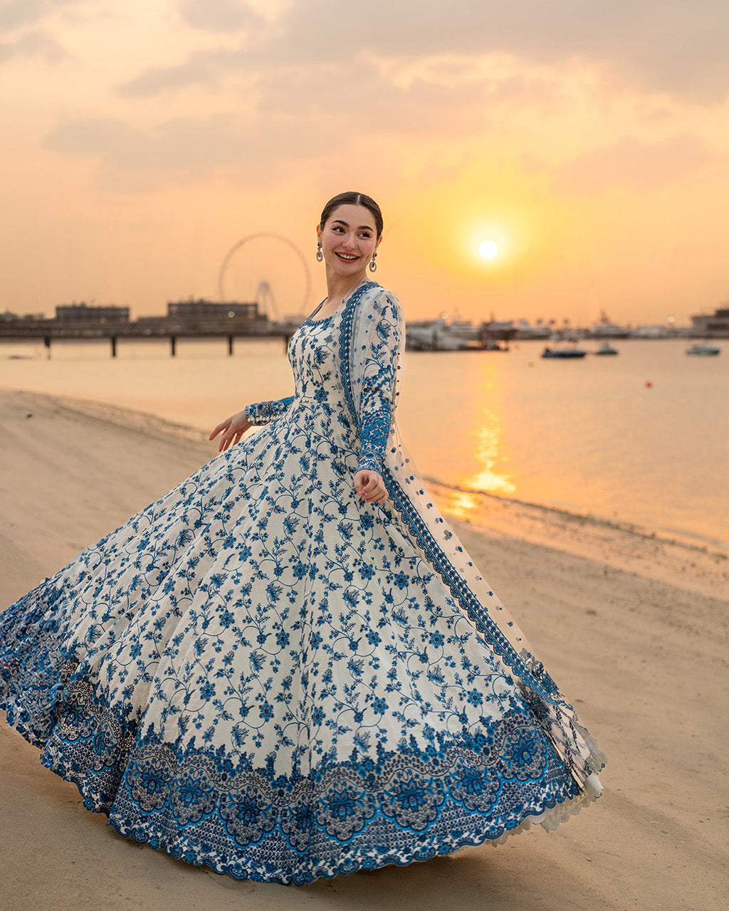 FAIZA SAQLAIN-FROCK 3PC LAWN EMBROIDERED SHIRT WITH NET EMBROIDERED DUPATTA AND TROUSER.