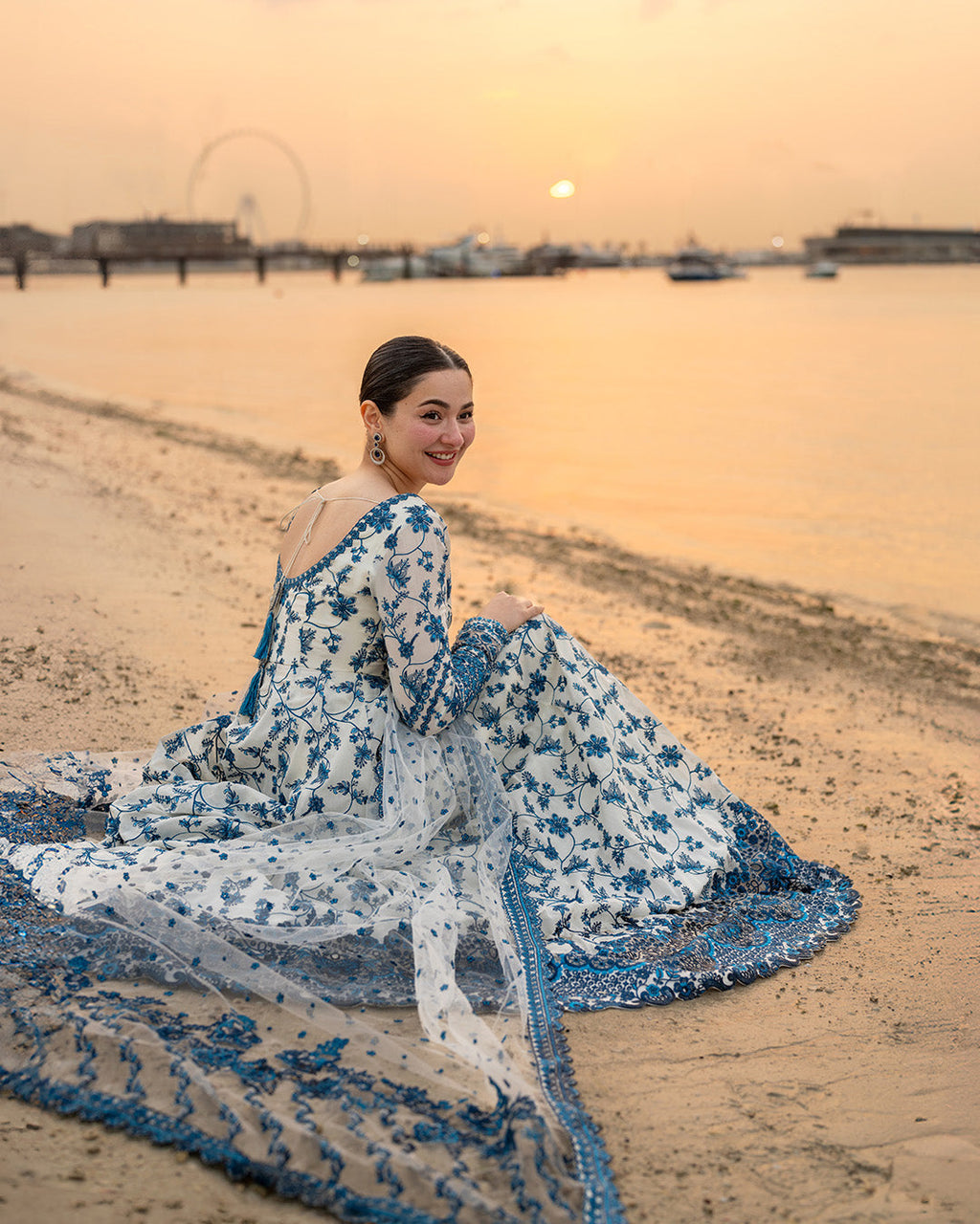 FAIZA SAQLAIN-FROCK 3PC LAWN EMBROIDERED SHIRT WITH NET EMBROIDERED DUPATTA AND TROUSER.