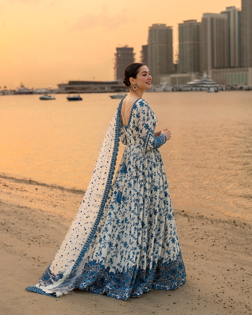 FAIZA SAQLAIN-FROCK 3PC LAWN EMBROIDERED SHIRT WITH NET EMBROIDERED DUPATTA AND TROUSER.